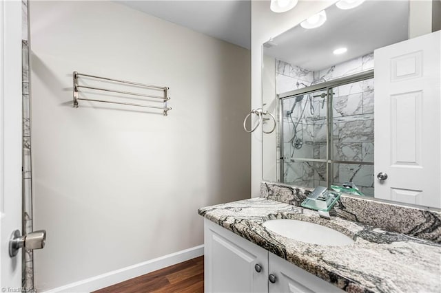 911 Chuppway Ct, Winston-Salem, NC 27106 - bathroom with vanity, wood finished floors, and a shower stall
