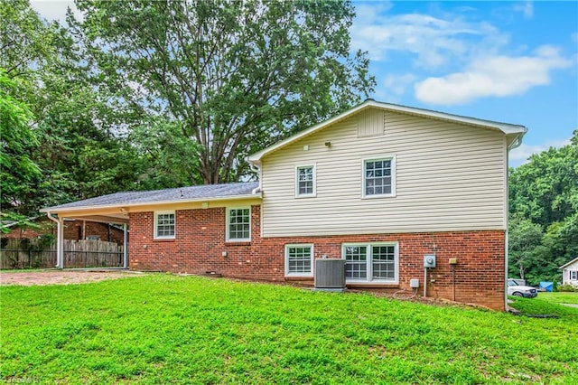 911 Chuppway Ct, Winston-Salem, NC 27106 - back of house with brick siding and an attached carport
