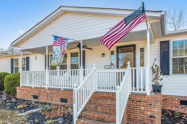 bungalow-style house featuring ceiling fan and a porch