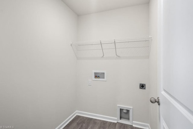 laundry area with hookup for a washing machine, dark wood-type flooring, and hookup for an electric dryer