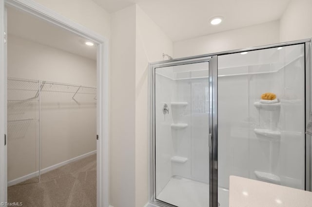 bathroom featuring an enclosed shower