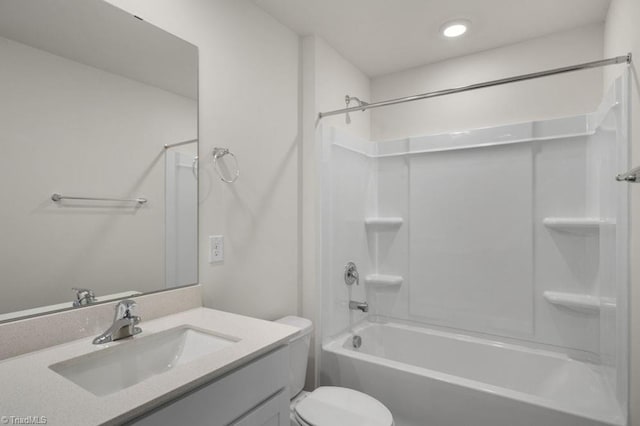 full bathroom with vanity, bathing tub / shower combination, and toilet