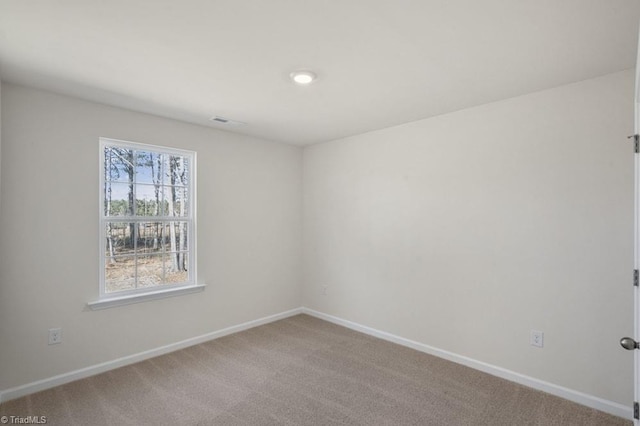 view of carpeted spare room