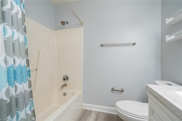 full bath with wood finished floors, shower / bath combination with curtain, toilet, vanity, and baseboards