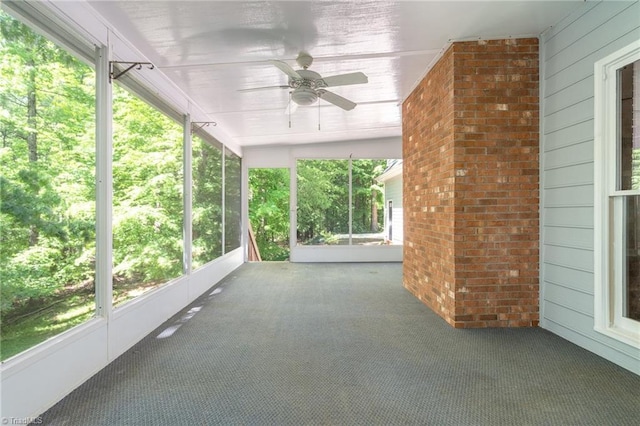 view of patio featuring ceiling fan