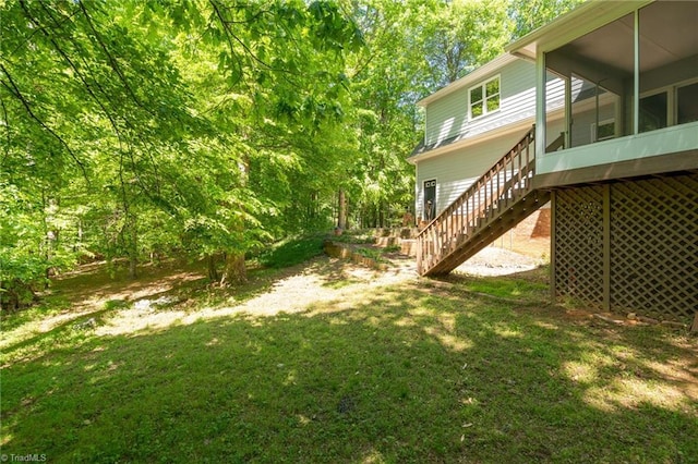 view of yard featuring stairs