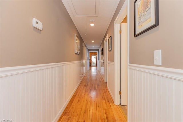 7715 W NC Highway 268, Wilkesboro, NC 28697 - hallway with wainscoting, light wood-style floors, attic access, and recessed lighting