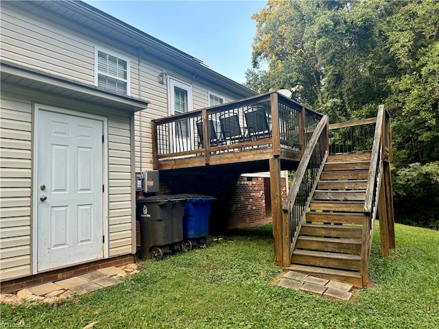 back of house with a yard and a deck