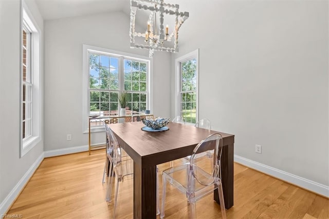 320 N Club Dr, Asheboro, NC 27205 - dining area featuring a chandelier, light wood-style floors, and lofted ceiling