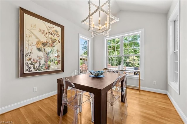 320 N Club Dr, Asheboro, NC 27205 - dining area featuring a chandelier, light wood-style flooring, and lofted ceiling