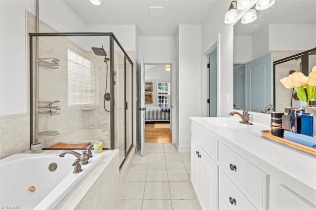 320 N Club Dr, Asheboro, NC 27205 - full bathroom with a jetted tub, a stall shower, vanity, tile patterned floors, and plenty of natural light
