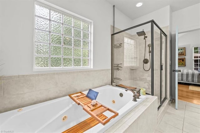 320 N Club Dr, Asheboro, NC 27205 - full bath with healthy amount of natural light, a shower stall, tile patterned floors, and a tub with jets