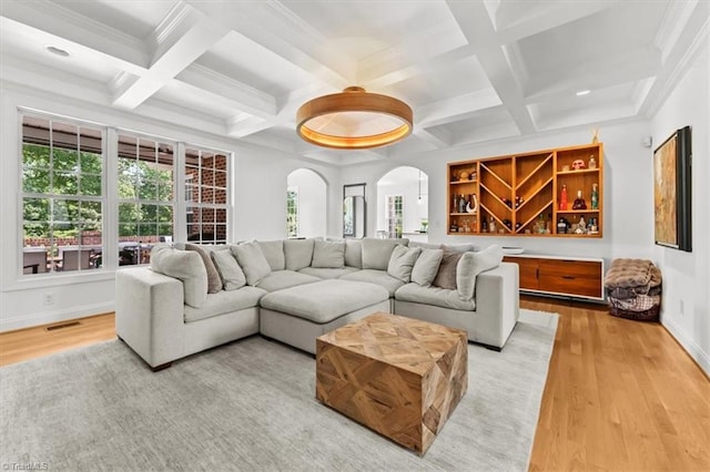 320 N Club Dr, Asheboro, NC 27205 - living area featuring arched walkways, light wood finished floors, beam ceiling, coffered ceiling, and recessed lighting