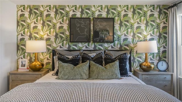 bedroom with wallpapered walls