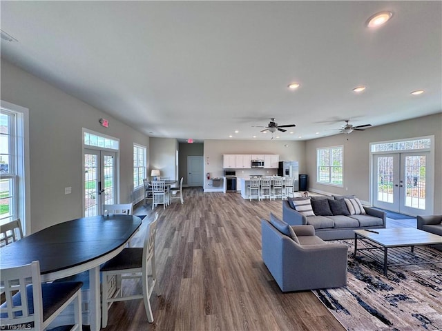 1087 Fairhaven Dr Lot 48, Mebane, NC 27302 - living room with french doors, wood finished floors, and recessed lighting