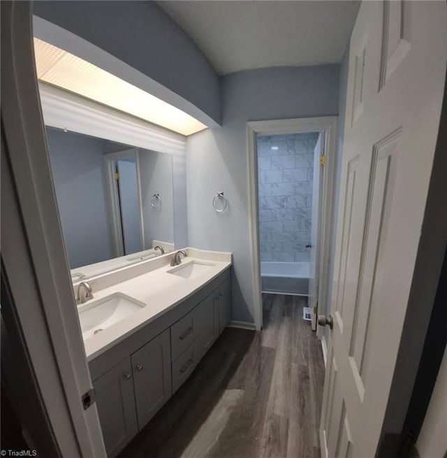 bathroom featuring hardwood / wood-style floors and vanity