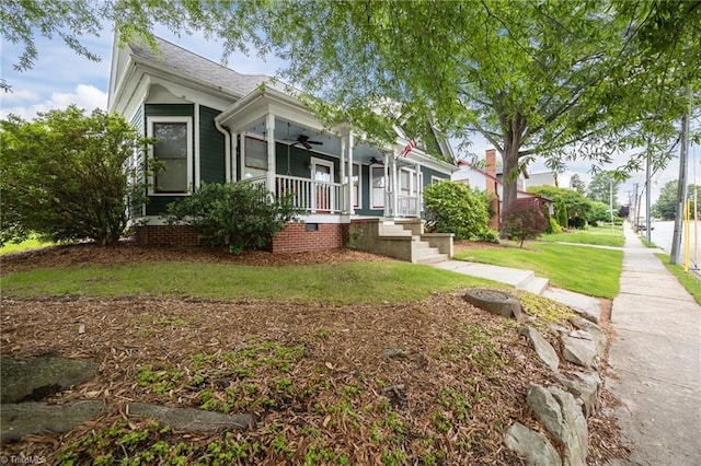 420 Mcadoo Ave, Greensboro, NC 27406 - view of front of property with a ceiling fan, covered porch, and a front yard