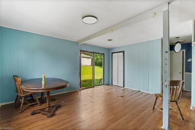 1020 Duchess Ct, Winston-Salem, NC 27107 - dining area with wood finished floors, beamed ceiling, and wood walls