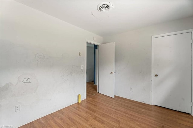 1020 Duchess Ct, Winston-Salem, NC 27107 - unfurnished bedroom with light wood-type flooring