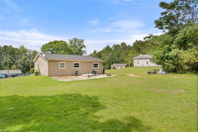 1020 Duchess Ct, Winston-Salem, NC 27107 - rear view of property with a patio and a lawn