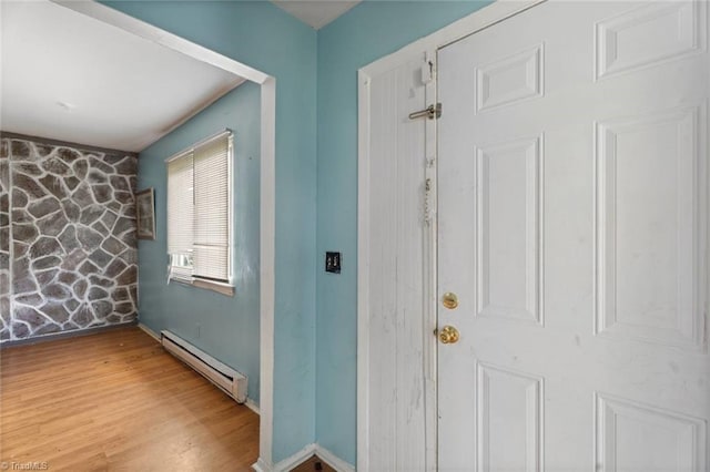 1020 Duchess Ct, Winston-Salem, NC 27107 - entrance foyer with baseboard heating and wood finished floors