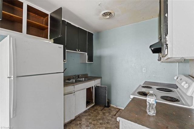 1020 Duchess Ct, Winston-Salem, NC 27107 - kitchen featuring white appliances, extractor fan, and dark cabinetry