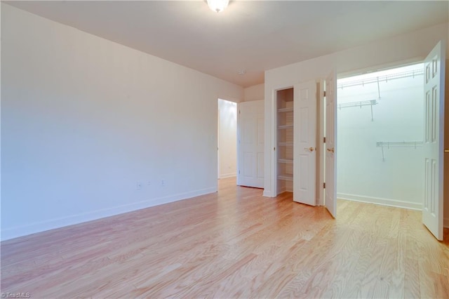 unfurnished bedroom featuring light hardwood / wood-style floors