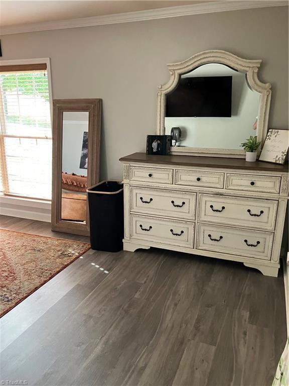 120 King Arthur Dr, King, NC 27021 - interior space with ornamental molding and dark wood-type flooring