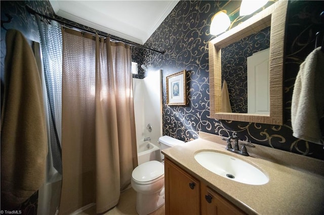 full bathroom with ornamental molding, vanity, shower / bath combination with curtain, and toilet