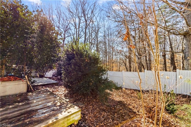 view of yard featuring a wooden deck