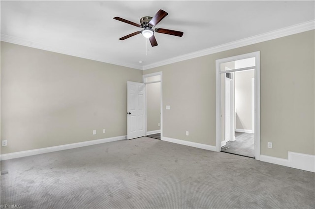 2101 Abbott Dr, Greensboro, NC 27455 - unfurnished bedroom featuring ornamental molding, carpet floors, and ceiling fan