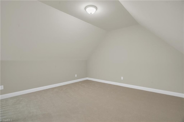 2101 Abbott Dr, Greensboro, NC 27455 - additional living space featuring vaulted ceiling and carpet floors