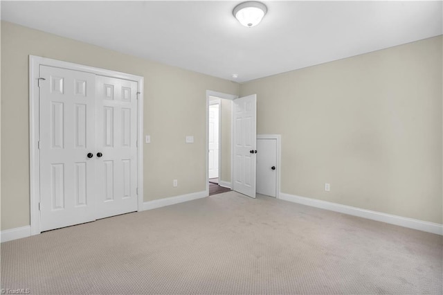 2101 Abbott Dr, Greensboro, NC 27455 - unfurnished bedroom with carpet and a closet
