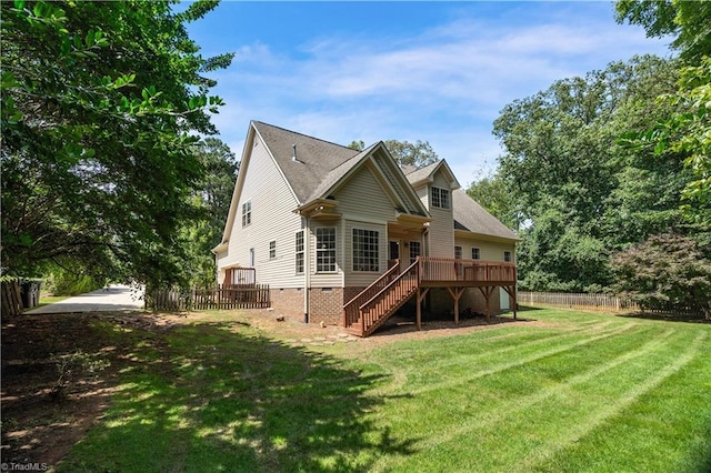 2101 Abbott Dr, Greensboro, NC 27455 - back of property featuring stairway, a wooden deck, and crawl space