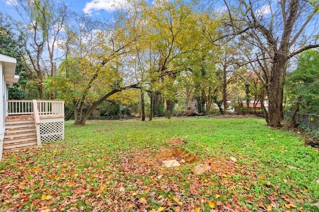 view of yard with a deck