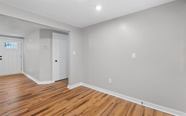 foyer with hardwood / wood-style flooring