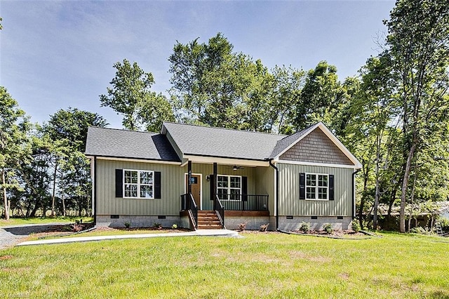 4503 Holly Leaf Rd, Ramseur, NC 27316 - view of front of home featuring crawl space, covered porch, a front lawn, and ceiling fan