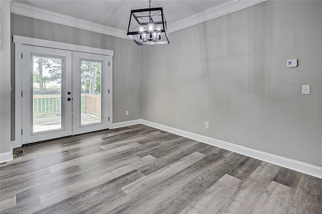 4503 Holly Leaf Rd, Ramseur, NC 27316 - unfurnished dining area featuring crown molding, french doors, a chandelier, dark wood-style floors, and baseboards