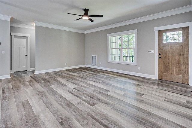 4503 Holly Leaf Rd, Ramseur, NC 27316 - unfurnished living room with wood finished floors, ornamental molding, a ceiling fan, and baseboards