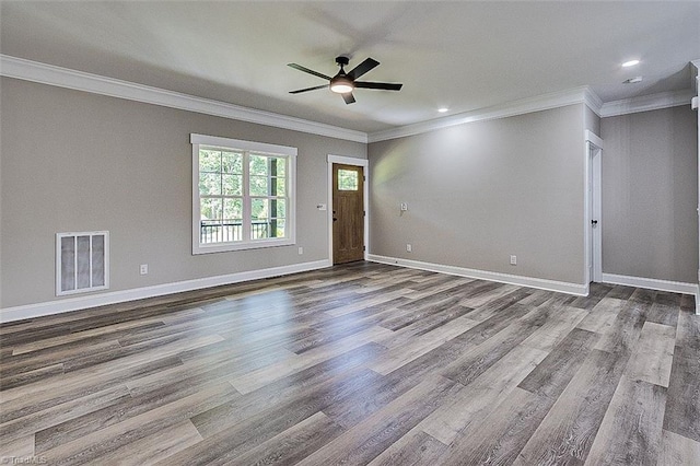 4503 Holly Leaf Rd, Ramseur, NC 27316 - foyer entrance featuring dark wood-style floors, crown molding, ceiling fan, baseboards, and recessed lighting