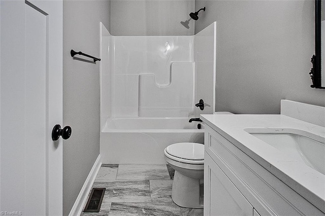 4503 Holly Leaf Rd, Ramseur, NC 27316 - bathroom featuring toilet, baseboards, marble look tiles,  shower combination, and vanity