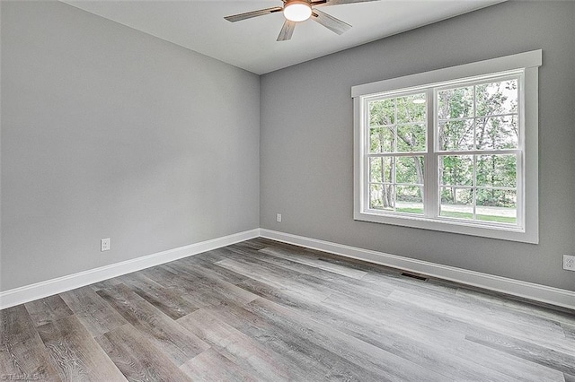 4503 Holly Leaf Rd, Ramseur, NC 27316 - empty room featuring ceiling fan, wood finished floors, and baseboards