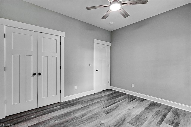 4503 Holly Leaf Rd, Ramseur, NC 27316 - unfurnished bedroom featuring wood finished floors, baseboards, a closet, and ceiling fan