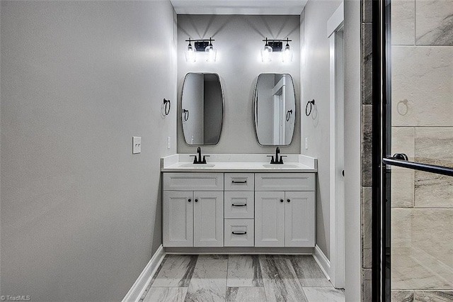 4503 Holly Leaf Rd, Ramseur, NC 27316 - full bath with marble finish flooring, baseboards, and double vanity