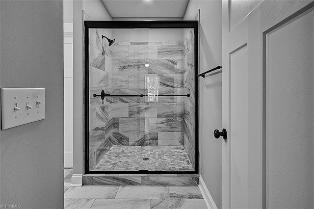 4503 Holly Leaf Rd, Ramseur, NC 27316 - full bath featuring marble finish floors, a stall shower, and baseboards