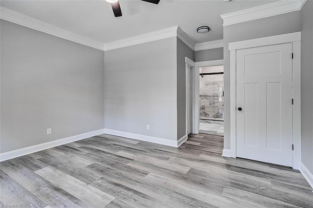 4503 Holly Leaf Rd, Ramseur, NC 27316 - empty room with ornamental molding, ceiling fan, baseboards, and wood finished floors