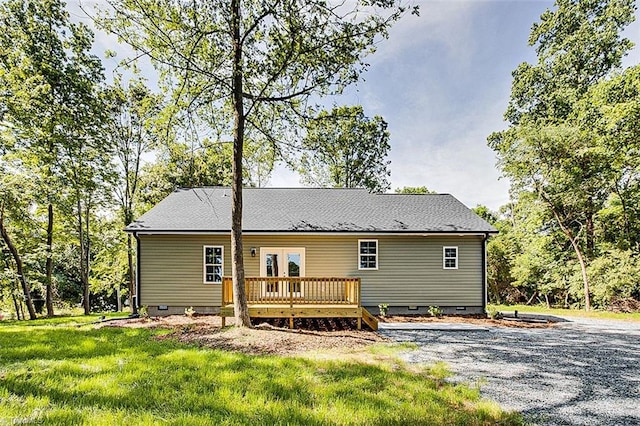 4503 Holly Leaf Rd, Ramseur, NC 27316 - rear view of house with crawl space, a wooden deck, a lawn, and french doors