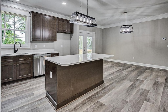4503 Holly Leaf Rd, Ramseur, NC 27316 - kitchen with dishwasher, french doors, a sink, ornamental molding, and dark brown cabinetry