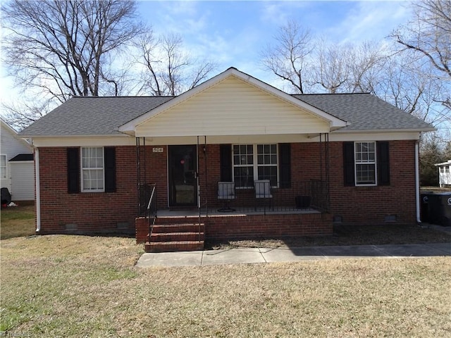 view of front of home featuring covered porch and a front lawn