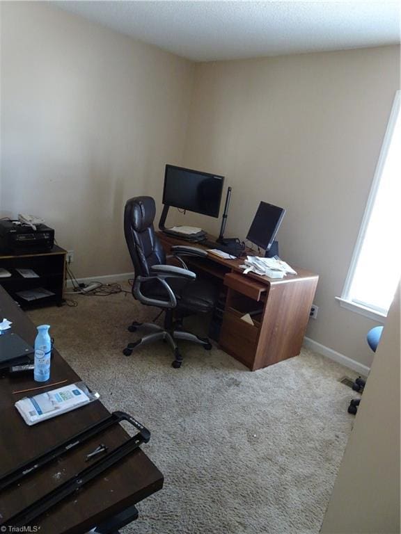 view of carpeted home office